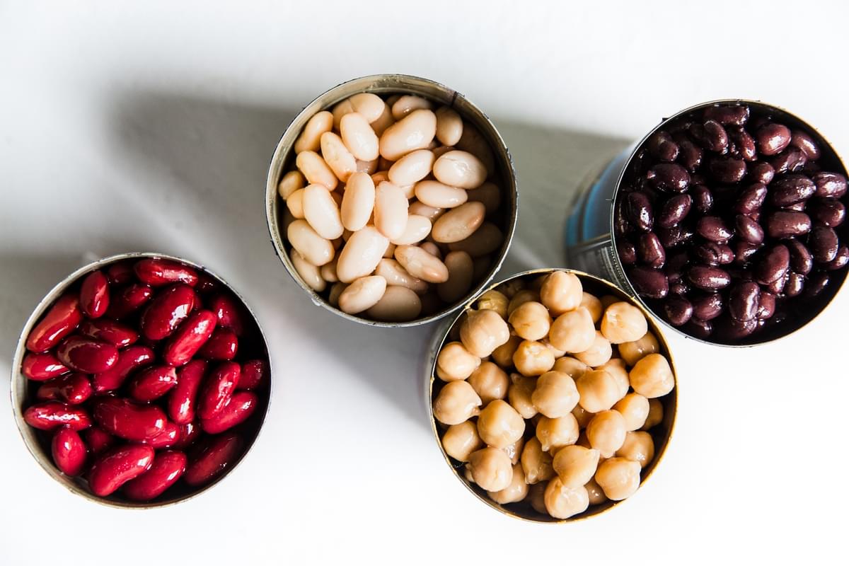 a can of kidney beans, a can of chickpeas, a can of black beans and a can of navy beans