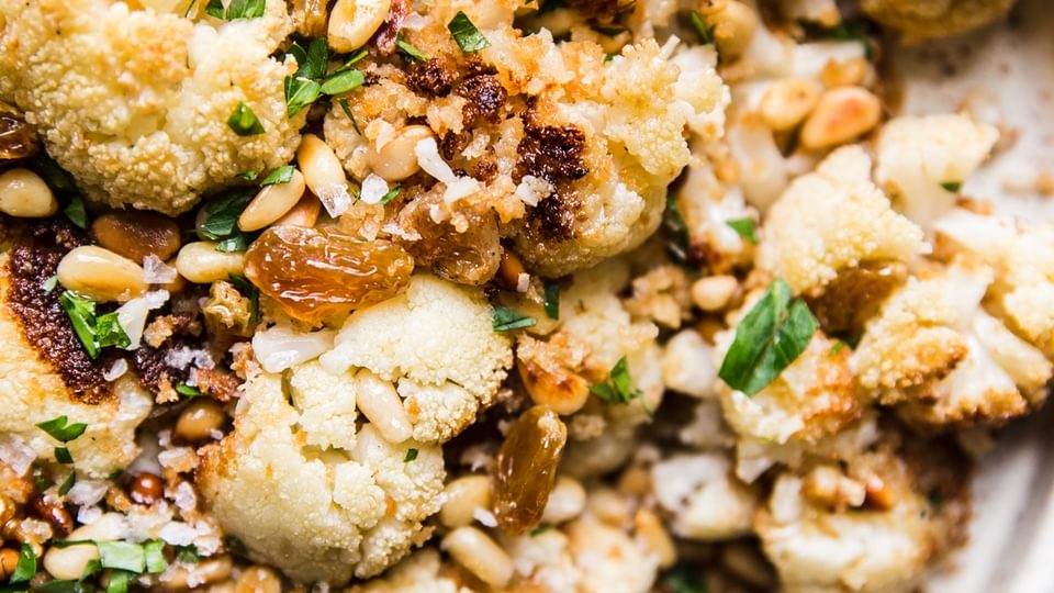 Roasted Cauliflower with Panko and golden raisins on a plate
