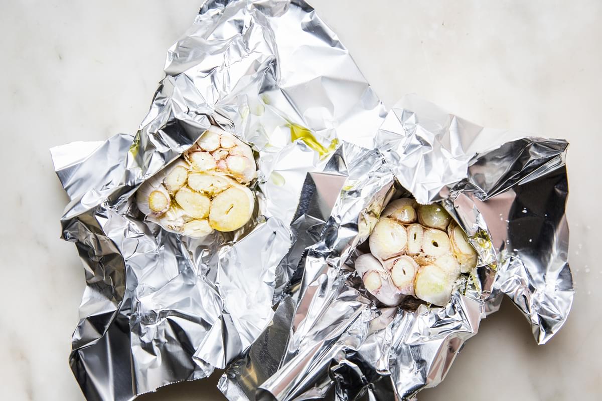 2 garlic heads wrapped in foil