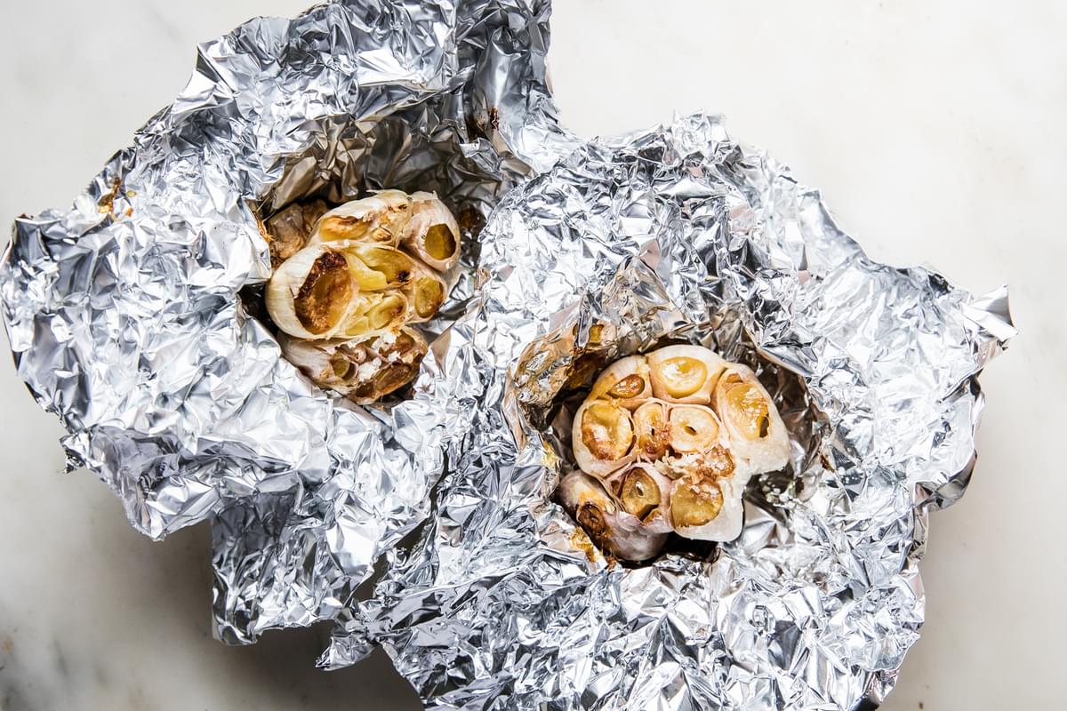 2 roasted garlic heads wrapped in foil