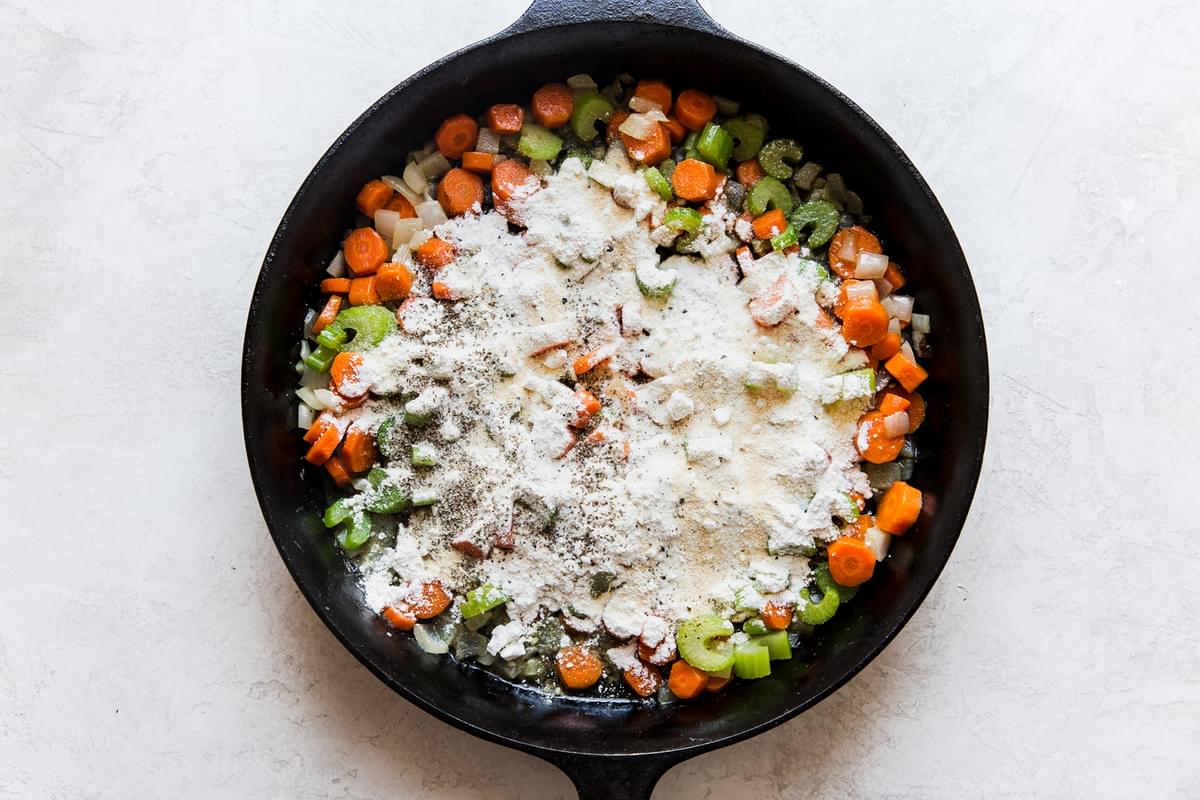 butter, carrots, onion and celery sautéed in a cast iron skillet with flour and seasoning.