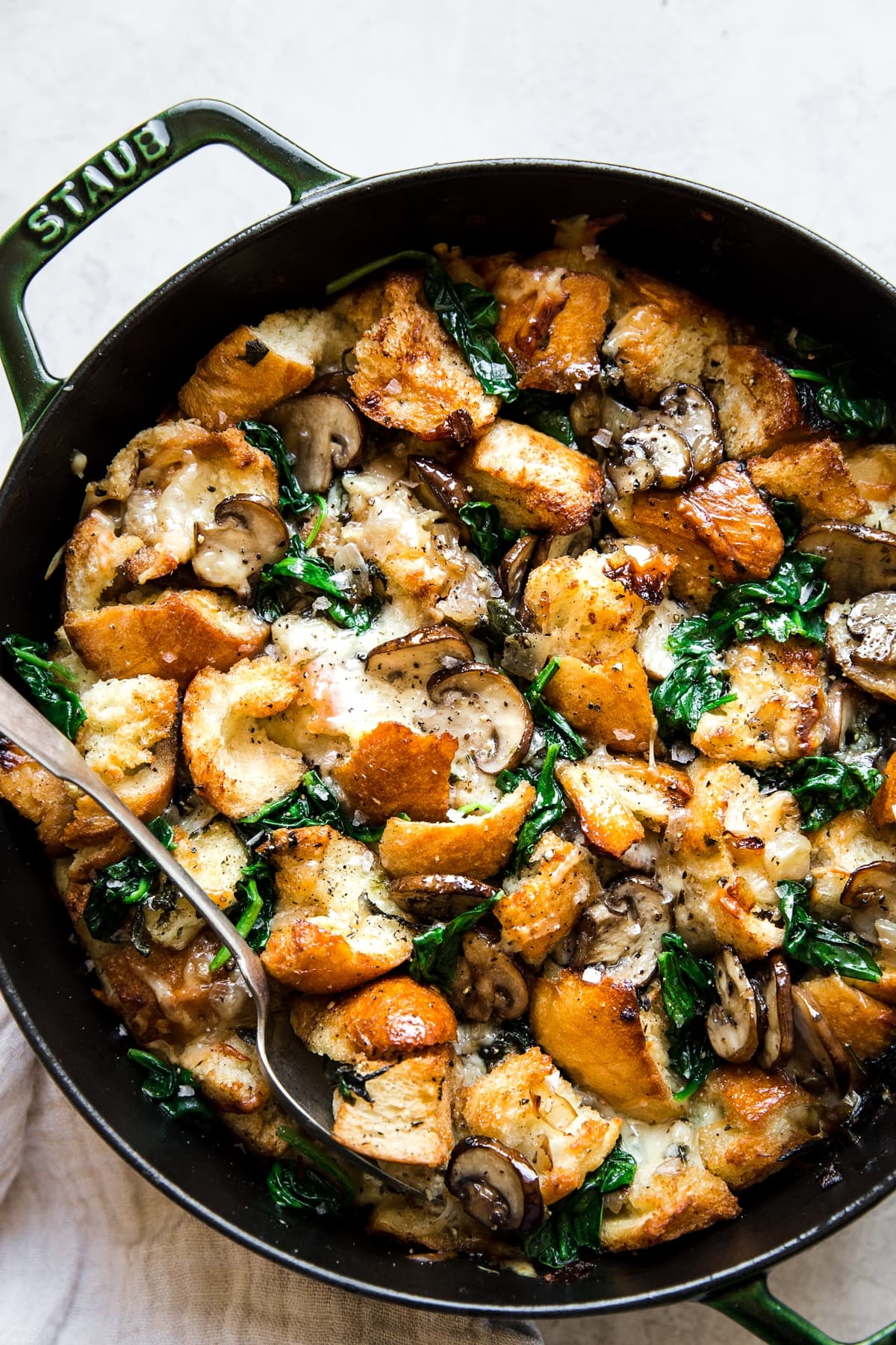 spinach mushroom strata baked in a dutch oven