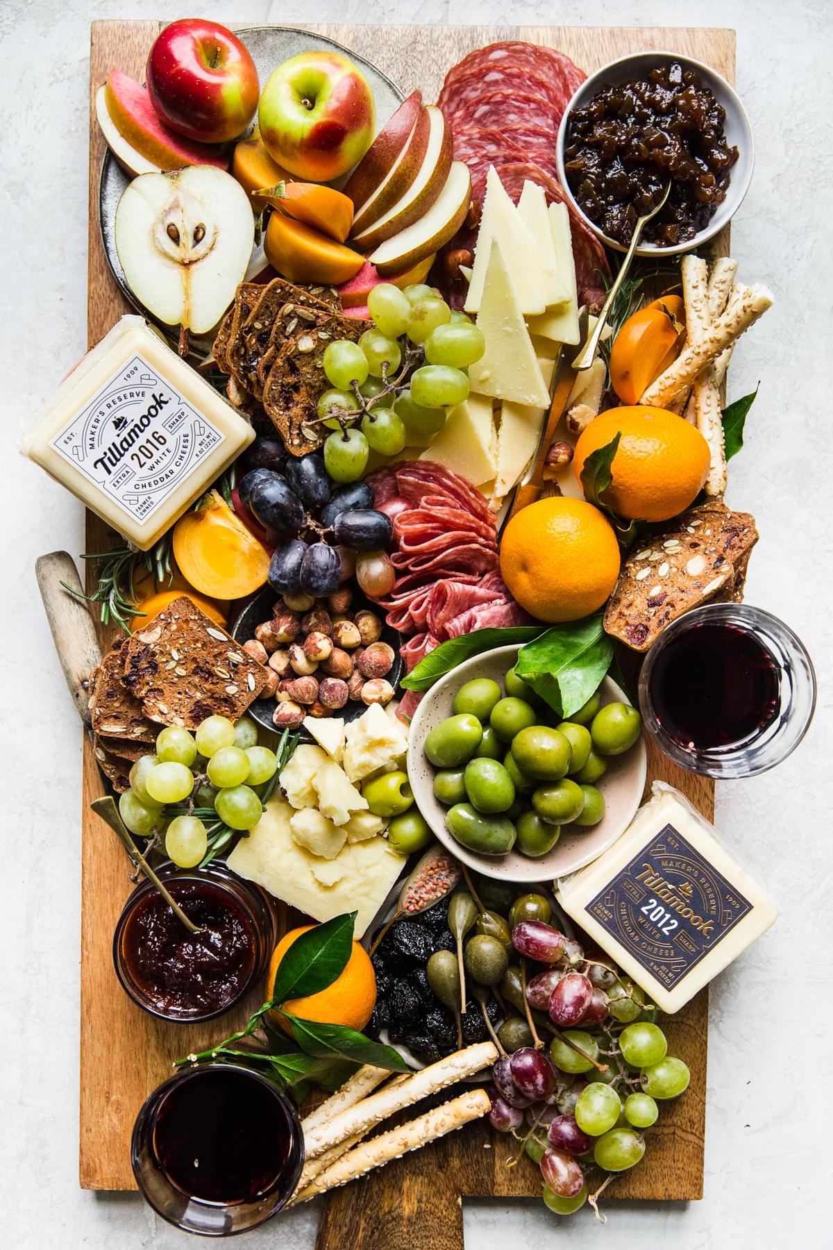 holiday cheese plate with Tillamook cheese, fruit, meats and spreads