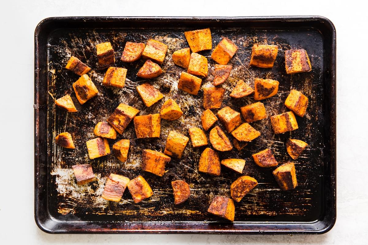 sheet pan of cubed roasted sweet potatoes