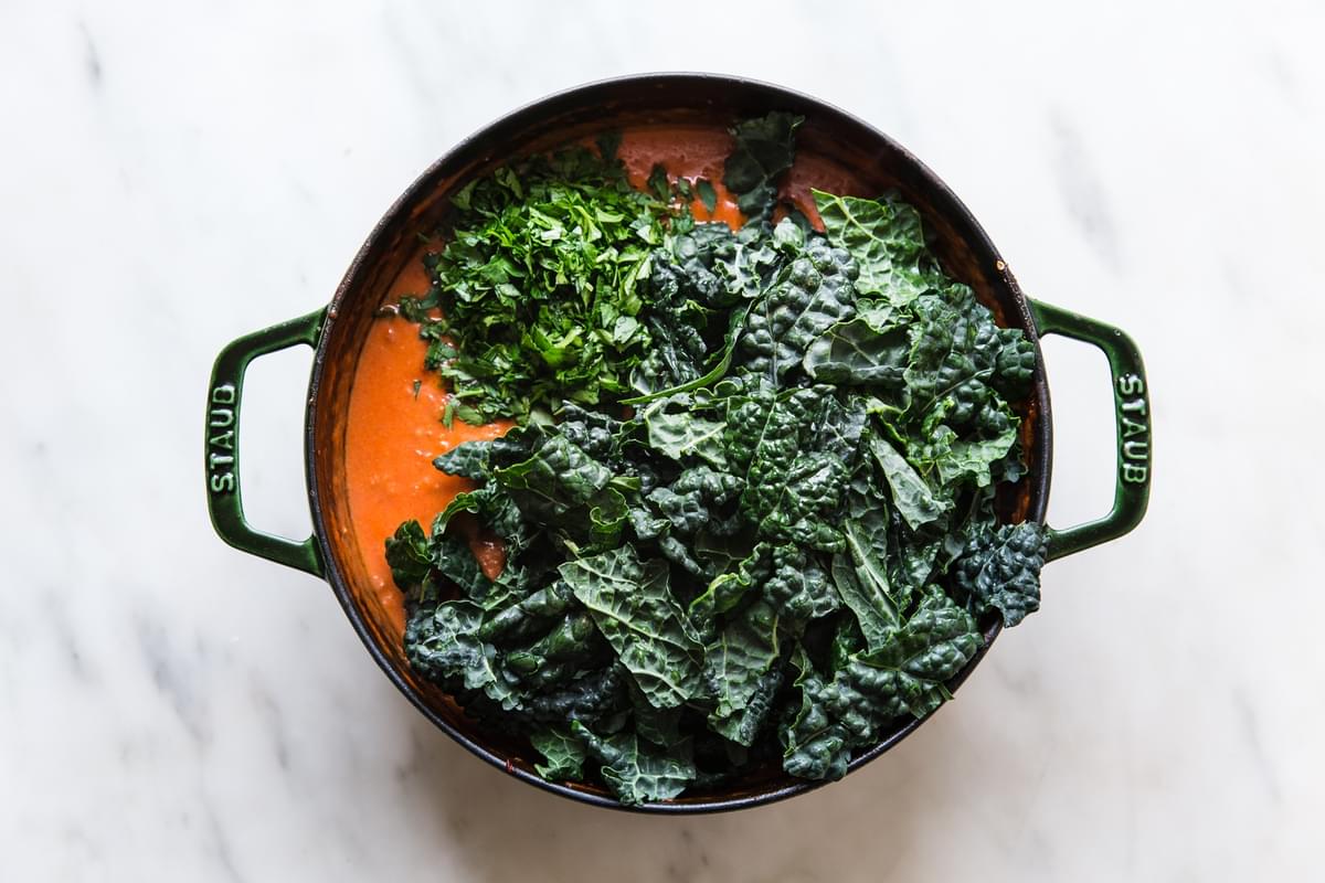 Tomato sauce with cream and parmesan cheese  and kale