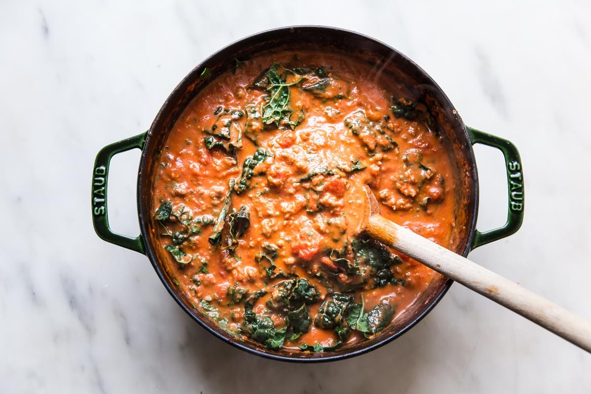 Tomato sauce with cream and parmesan cheese  and kale