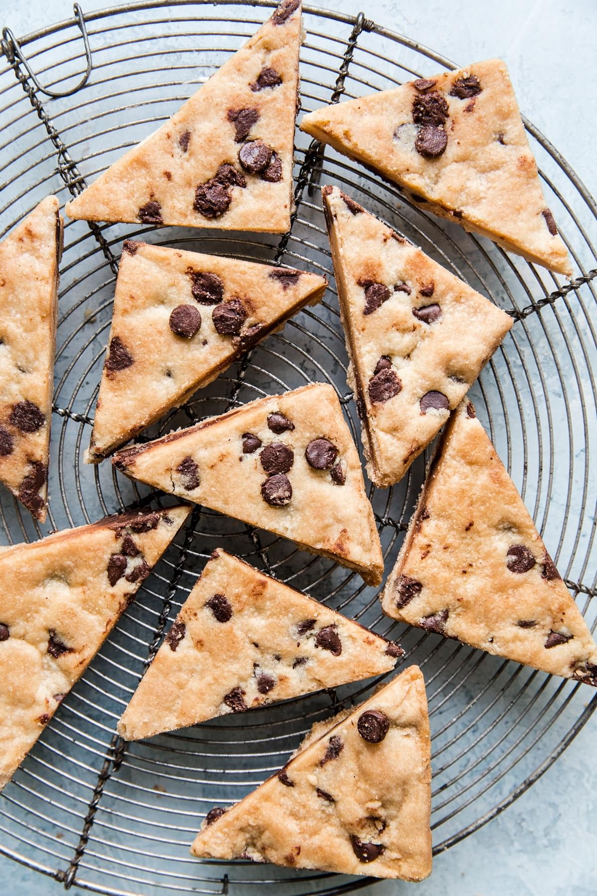 cookie brittle cut into triangles on a cooling rack