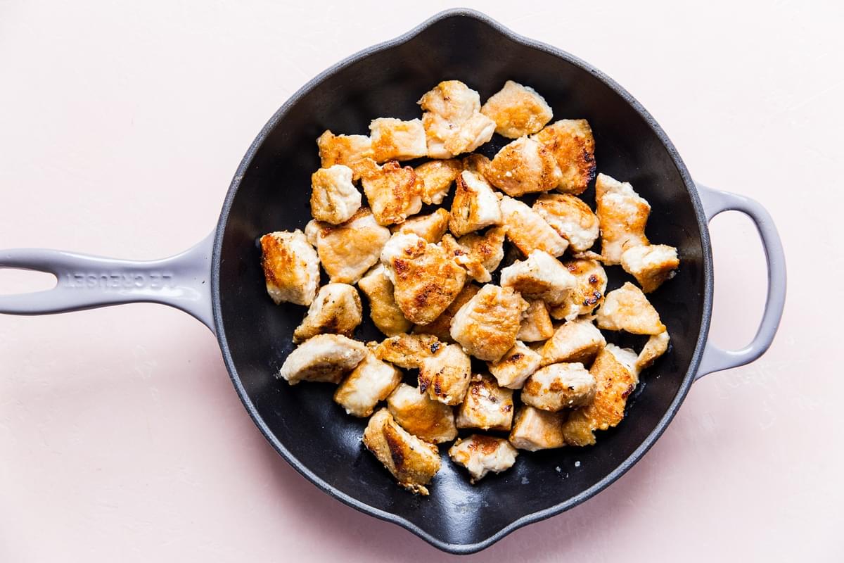 crispy chicken in a saute pan