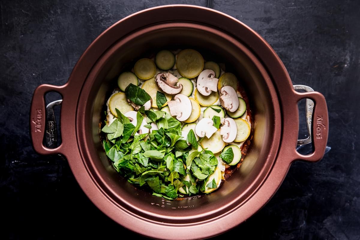 spinach, mushrooms and zucchini layered into a crockpot