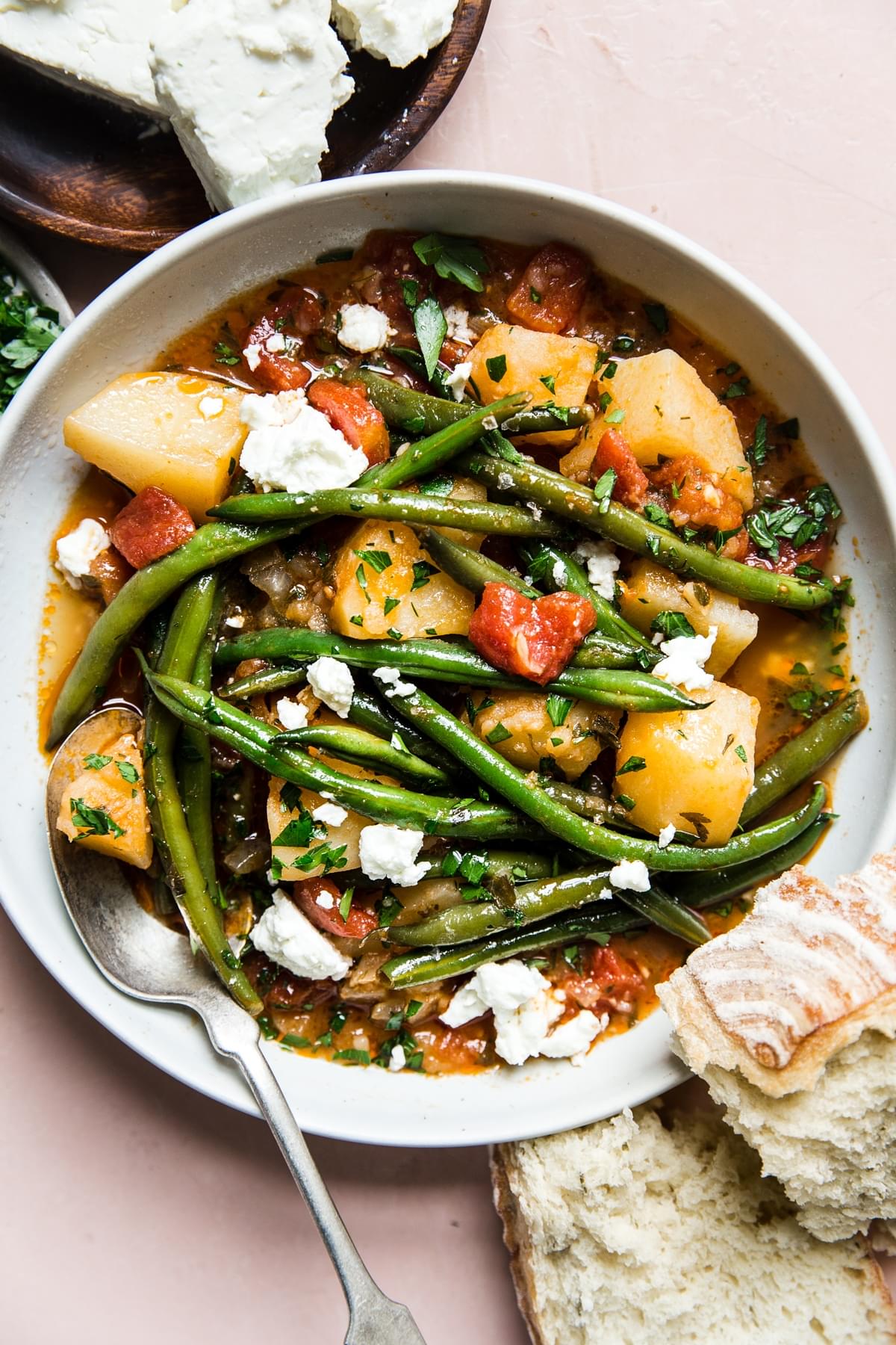 Fasolakia Greek Green Beans with potatoes, tomatoes and feta and crusty bread