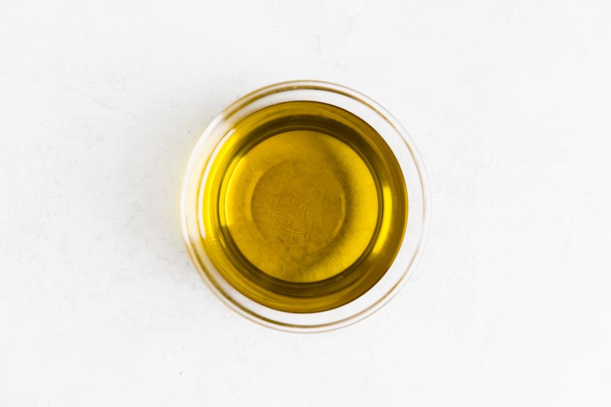 Extra virgin olive oil in a small glass jar