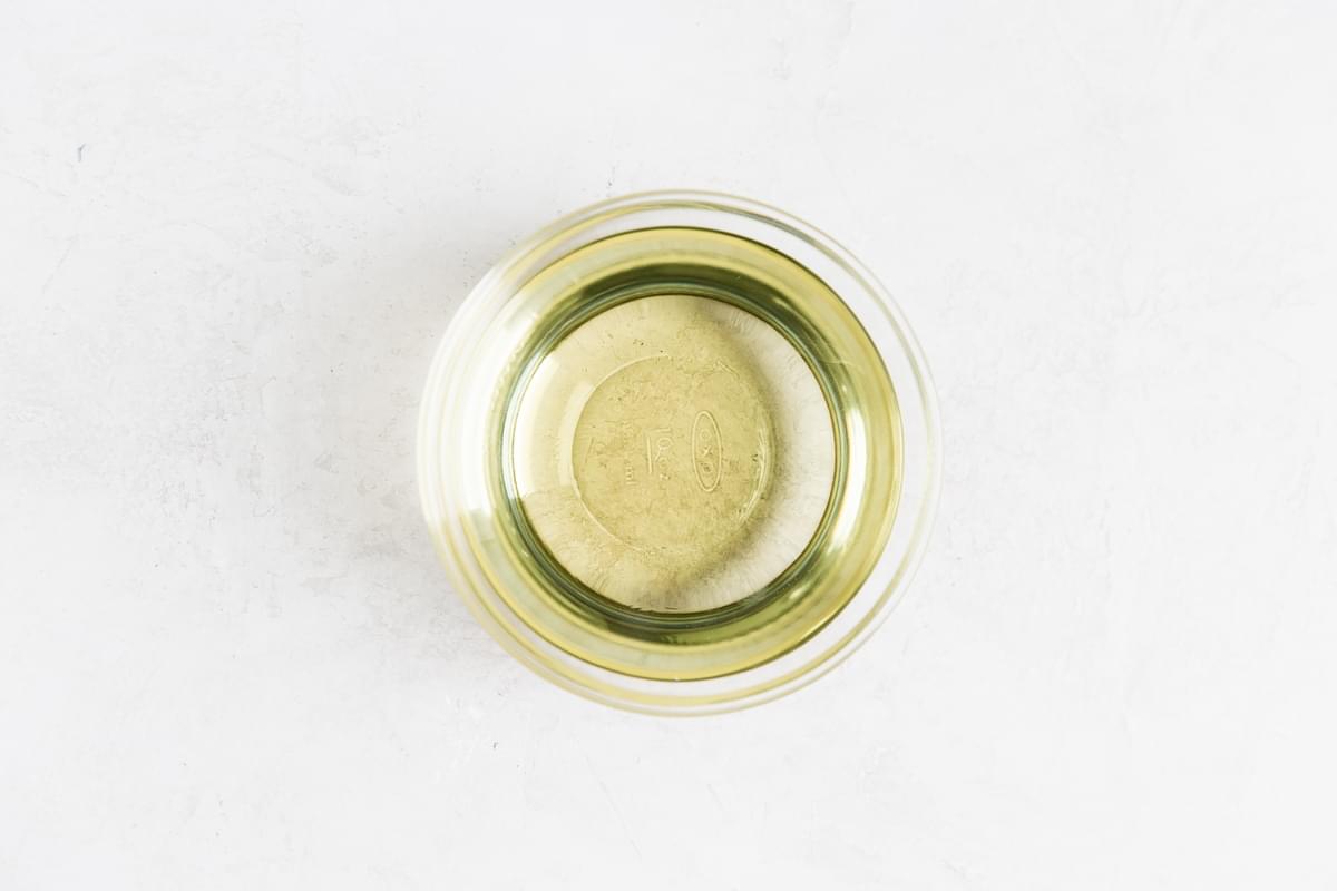 Extra light tasting olive oil in a small glass bowl