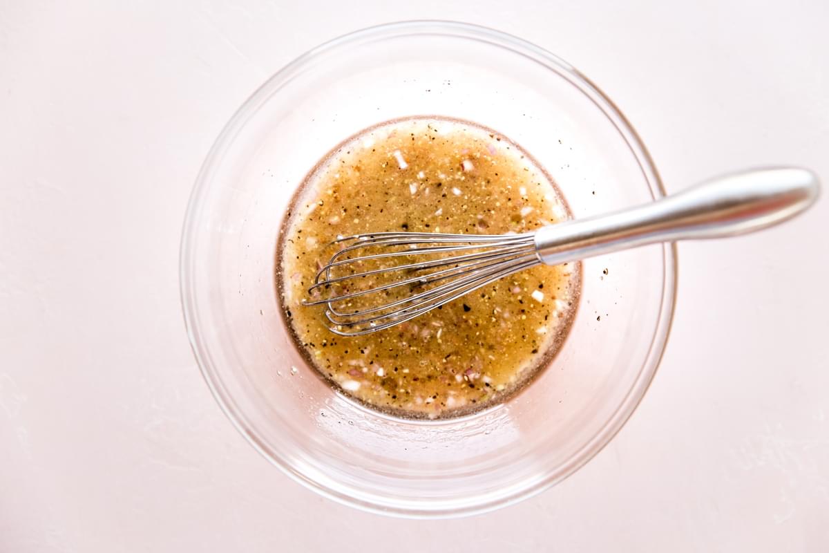 Honey Mustard Salad Dressing in a bowl with a whisk