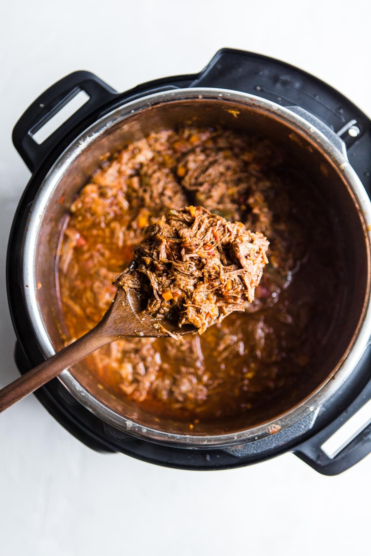 instant pot with shredded beef ragu