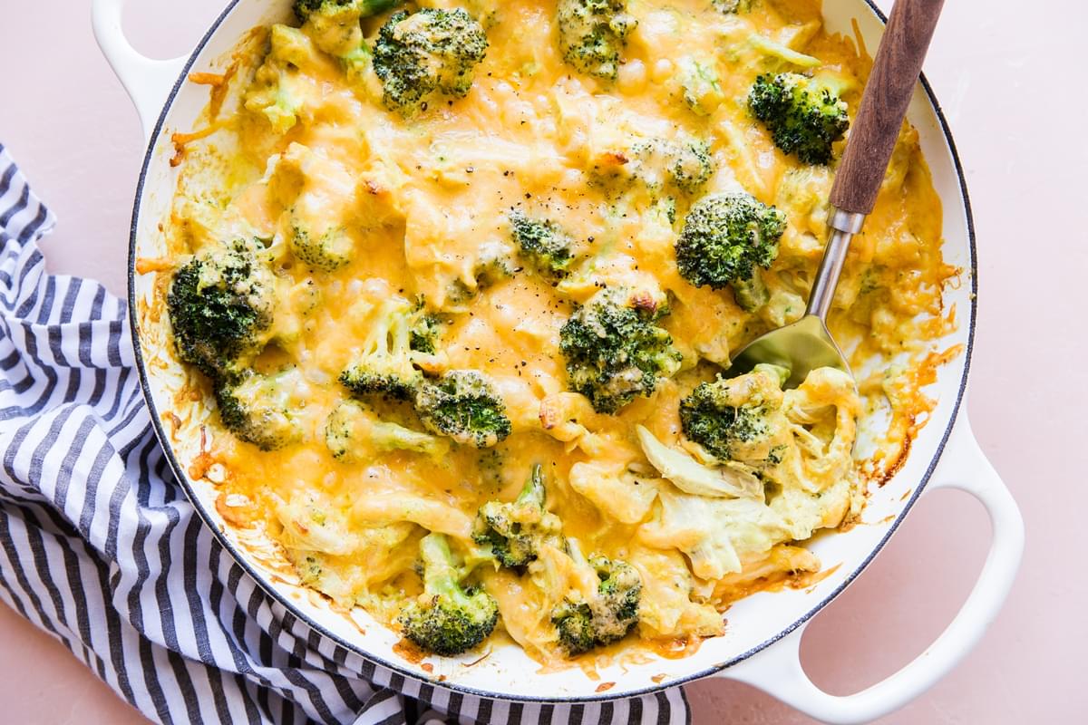 Low carb Chicken divan with broccoli and cheese in a pan with a spoon