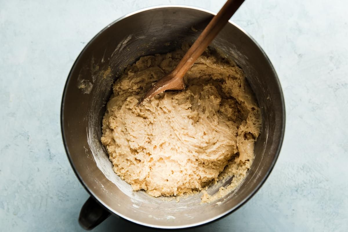 mixing bowl with batter for moms zucchini bread muffins