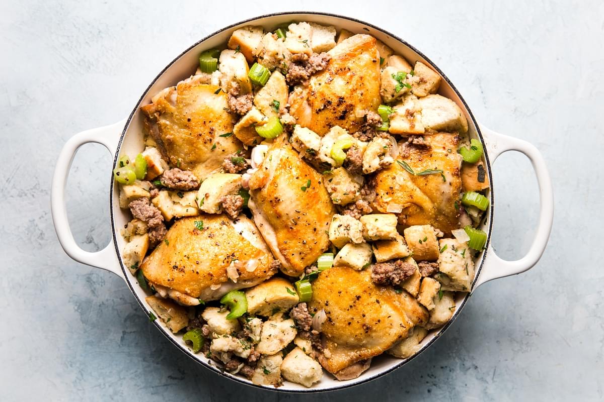 one pot chicken and stuffing casserole in a large white skillet