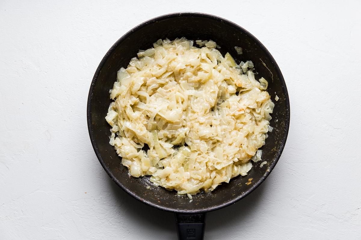 easy Caramelized Onions in a black pan
