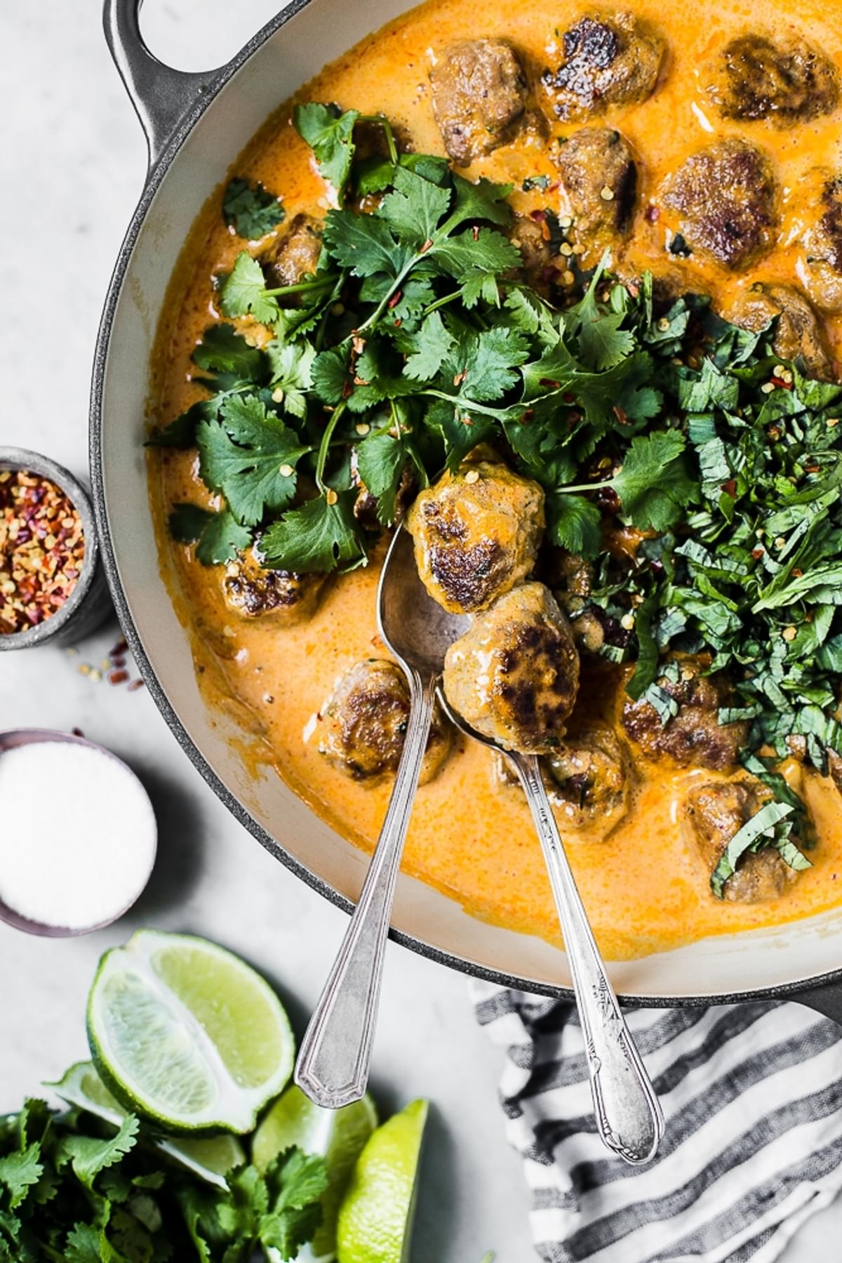 low carb turkey meatballs in a creamy curry sauce topped with fresh cilantro