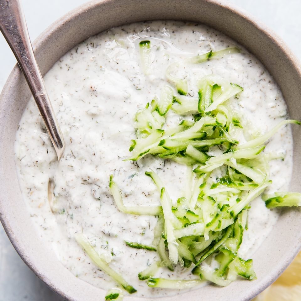 Tzatziki Sauce in a bowl with a spoon