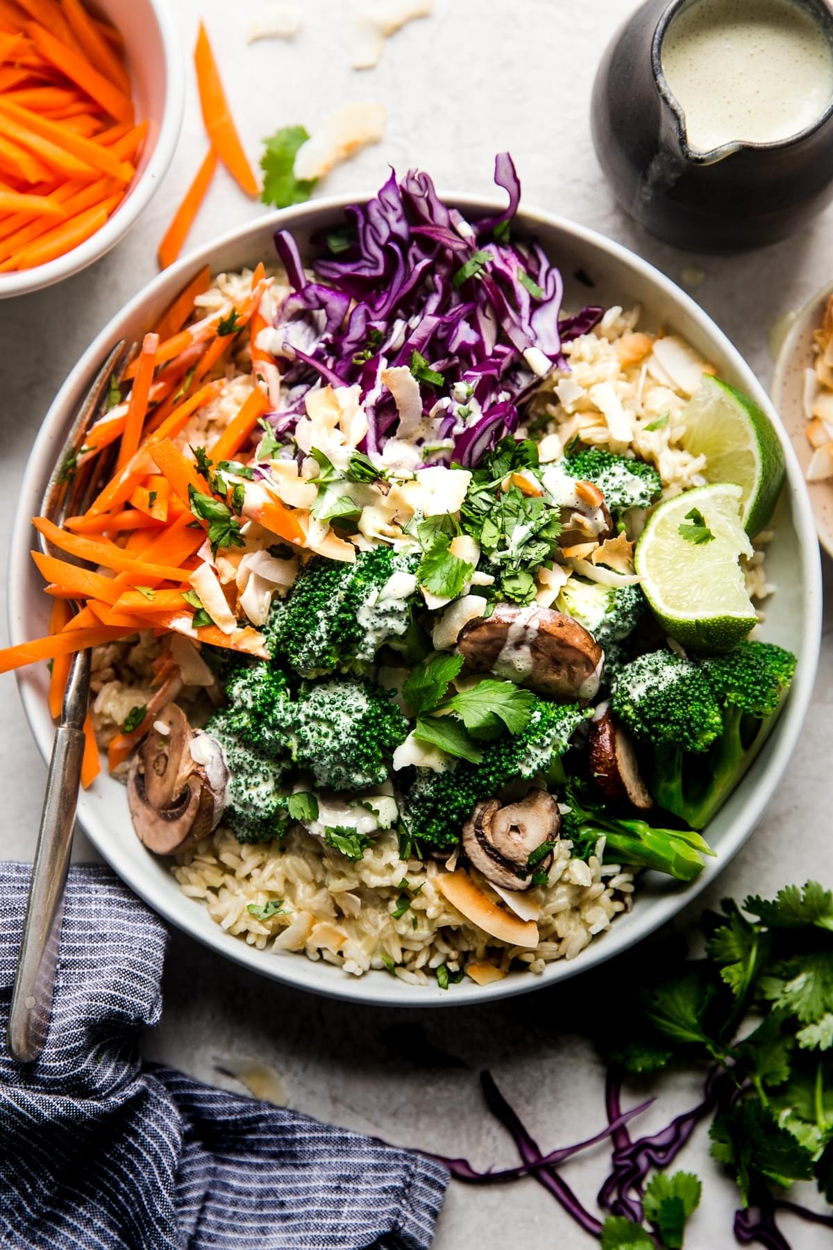 vegetarian rice bowl with green curry and veggies.