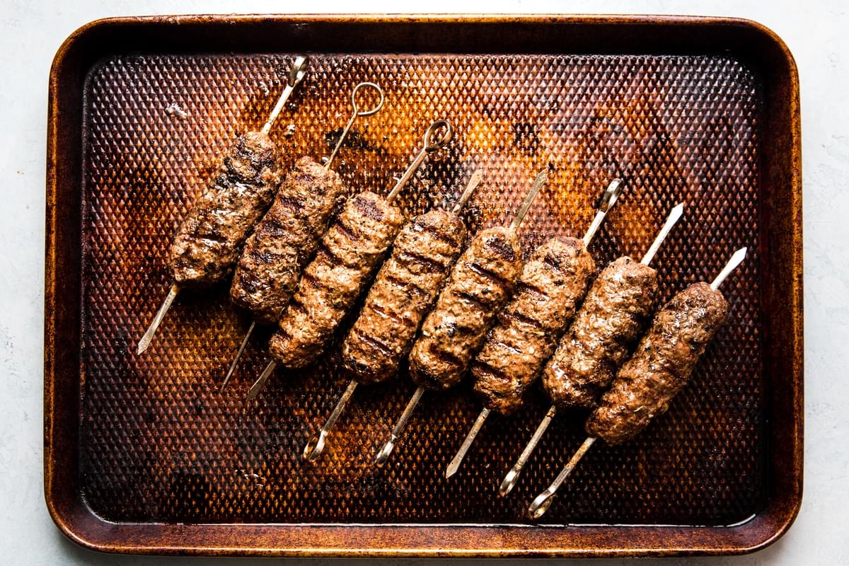 grilled beef kofta on a sheet pan