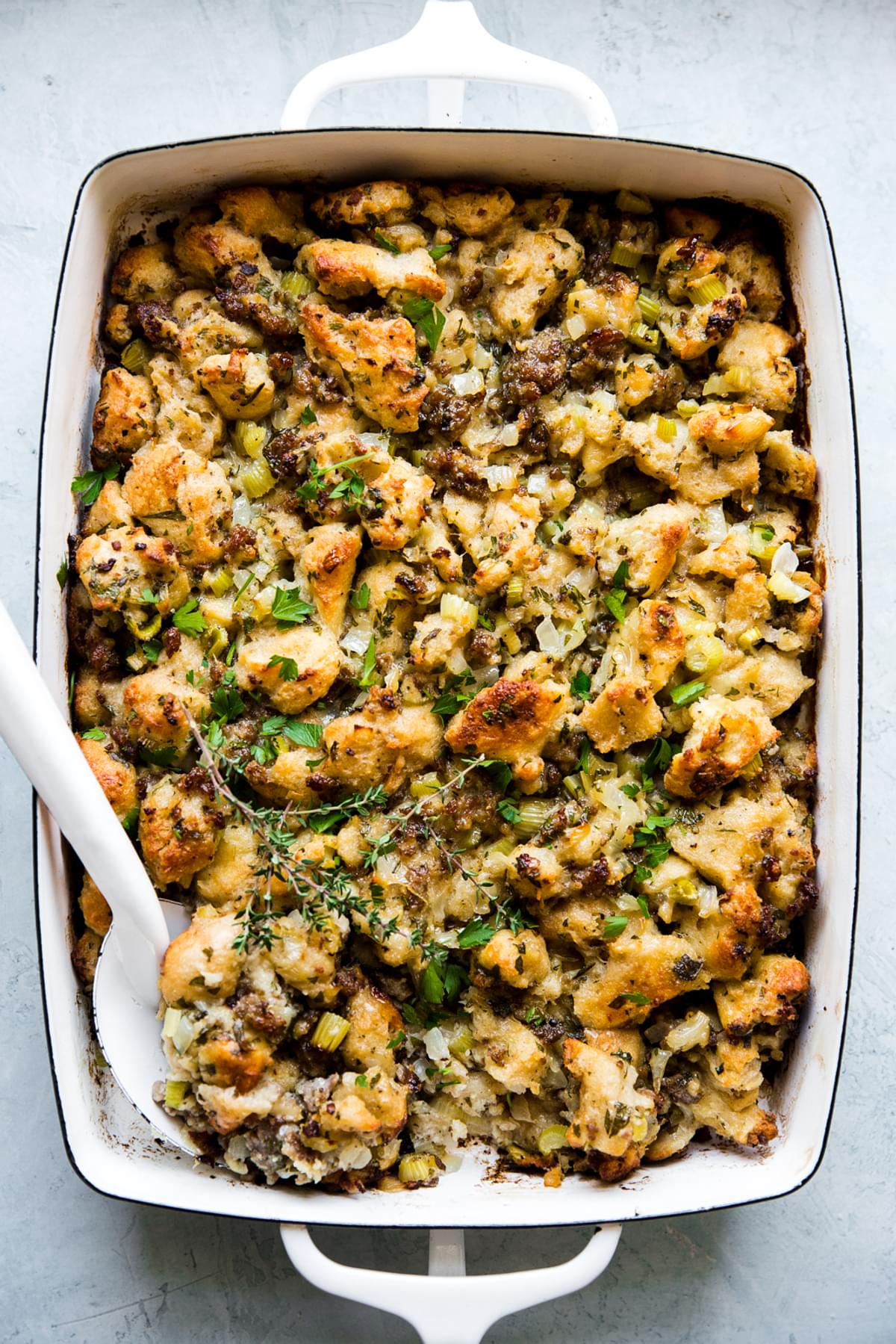 classic bread stuffing in a baking dish with sage