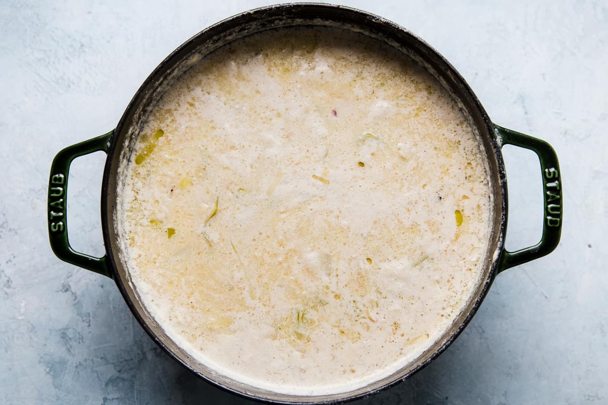 leeks, butter, chicken stock, potatoes, milk, salt and pepper in a soup pot