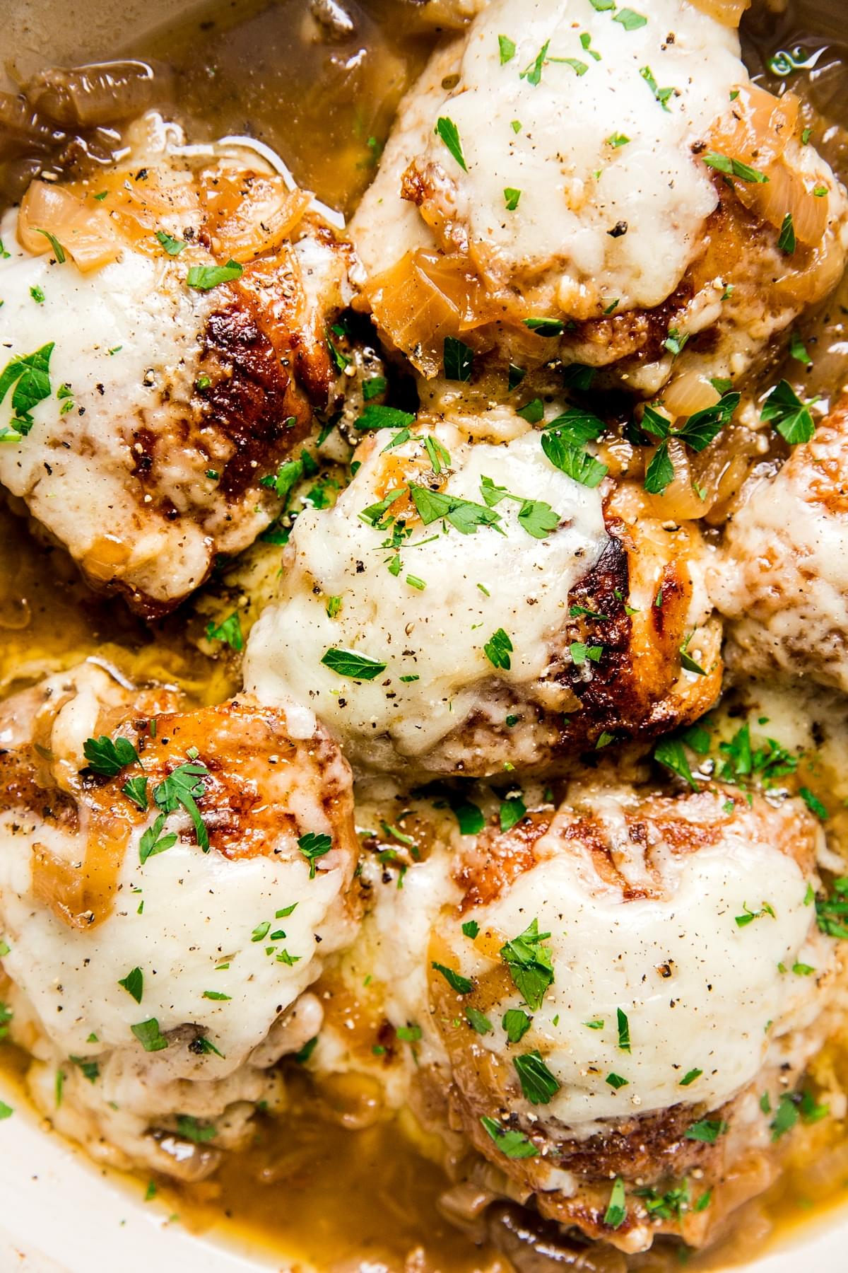 french onion chicken garnished with parsley