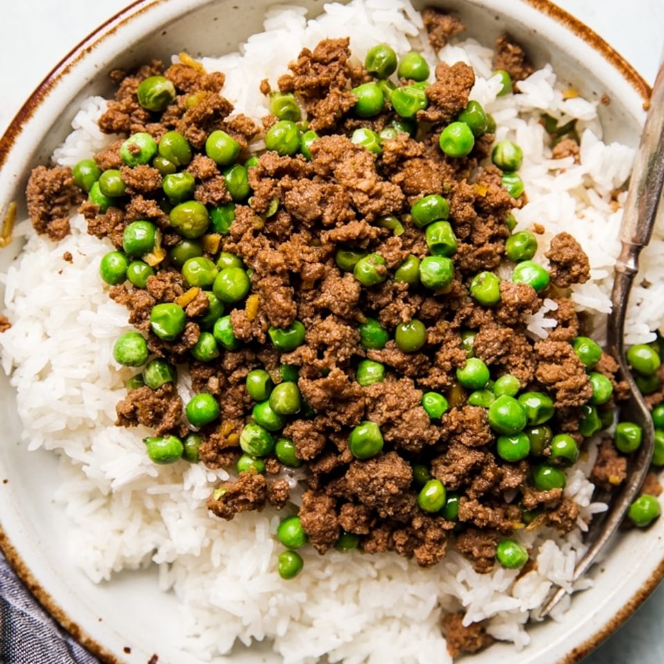 Gingery Ground Beef (Soboro Danbury) with peas on a plate