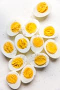 hard boiled eggs cut in half sprinkled with cracked pepper