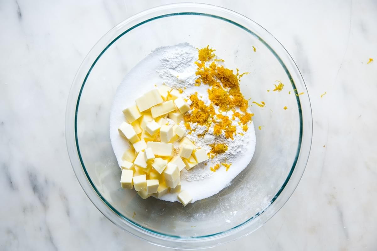 glass bowl with butter, flour, lemon zest for homemade shortcake