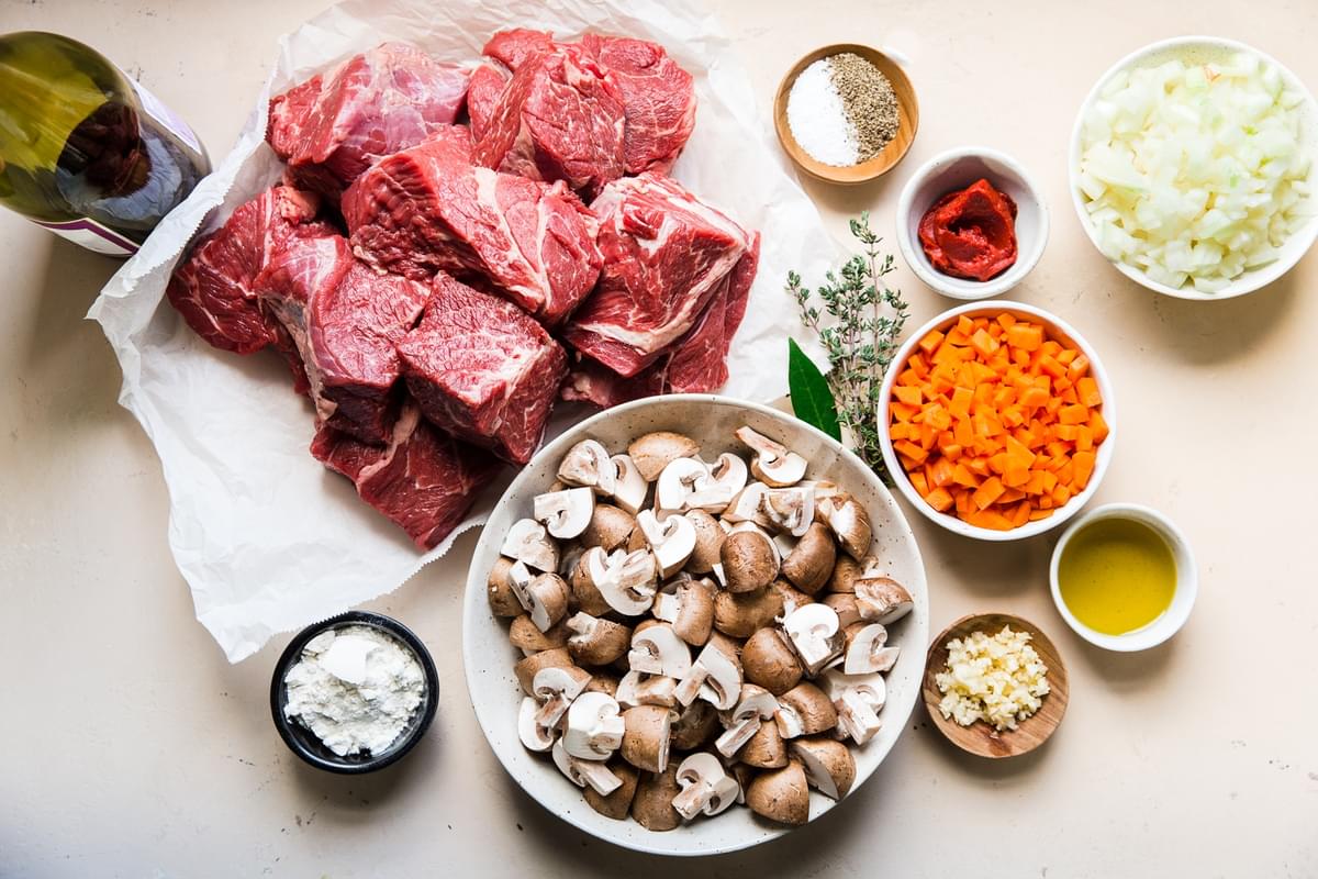 ingredients for wine braised beef in small bowls