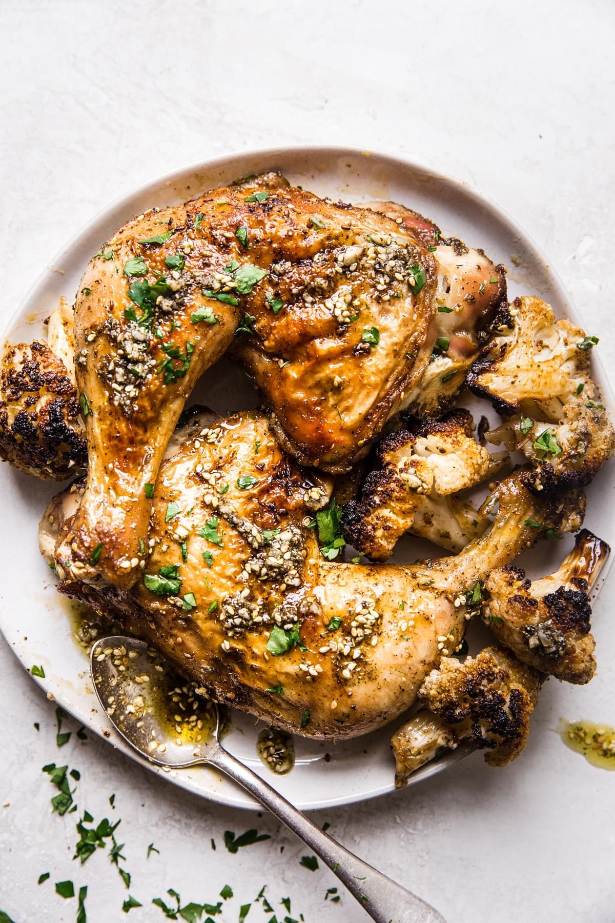 za'atar chicken sheetpan dinner on a white plate