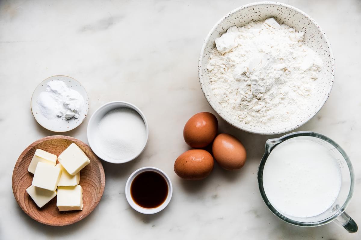 buttermilk pancake ingredients flour, baking powder, baking soda, sugar, salt, eggs, butter and vanilla