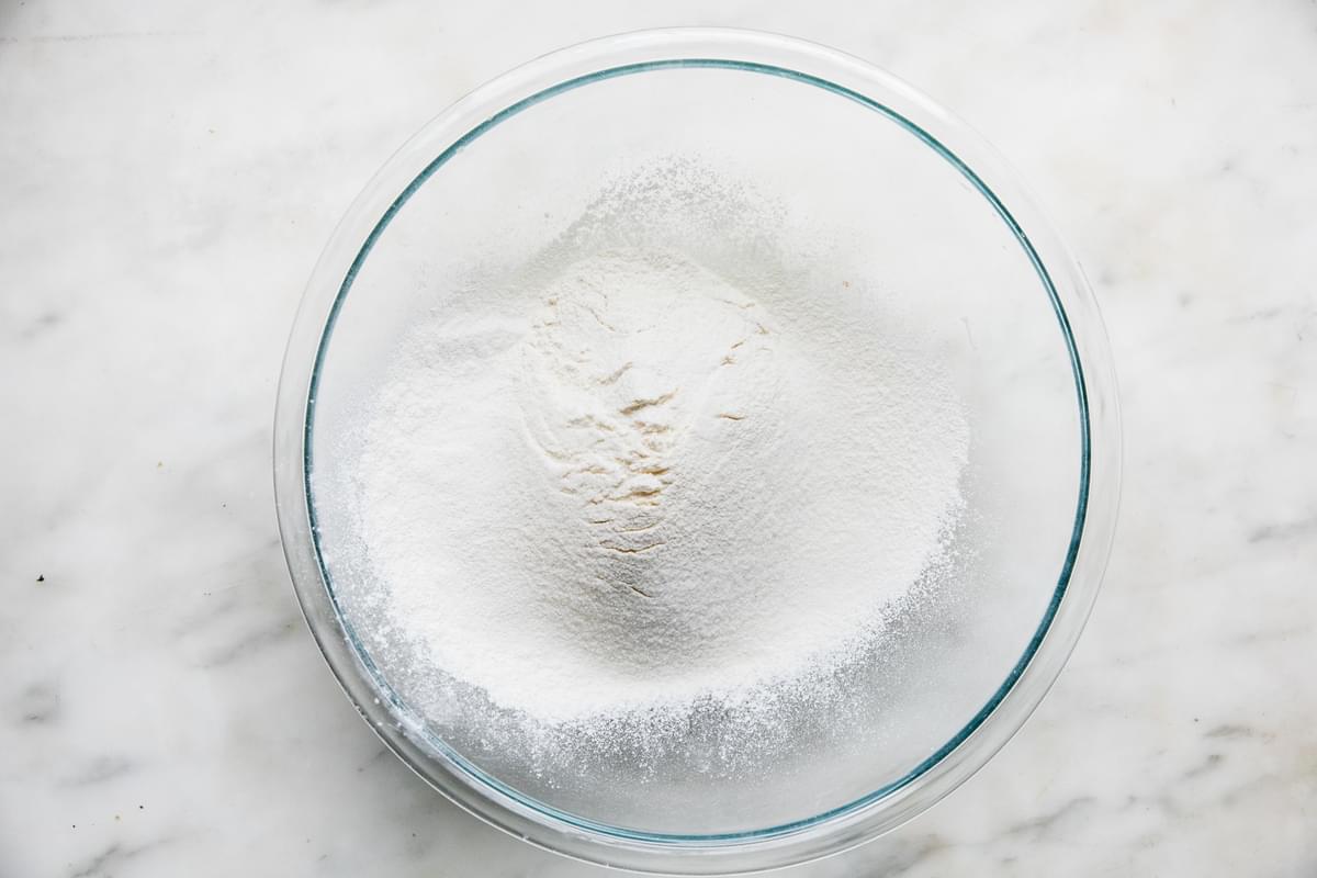 flour, baking powder, baking soda, sugar and salt in a bowl