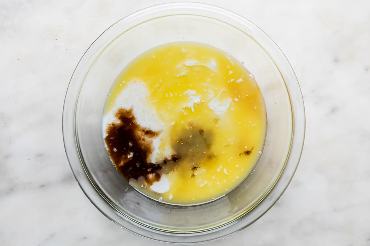 buttermilk, egg yolks, melted butter, and vanilla extract in a bowl
