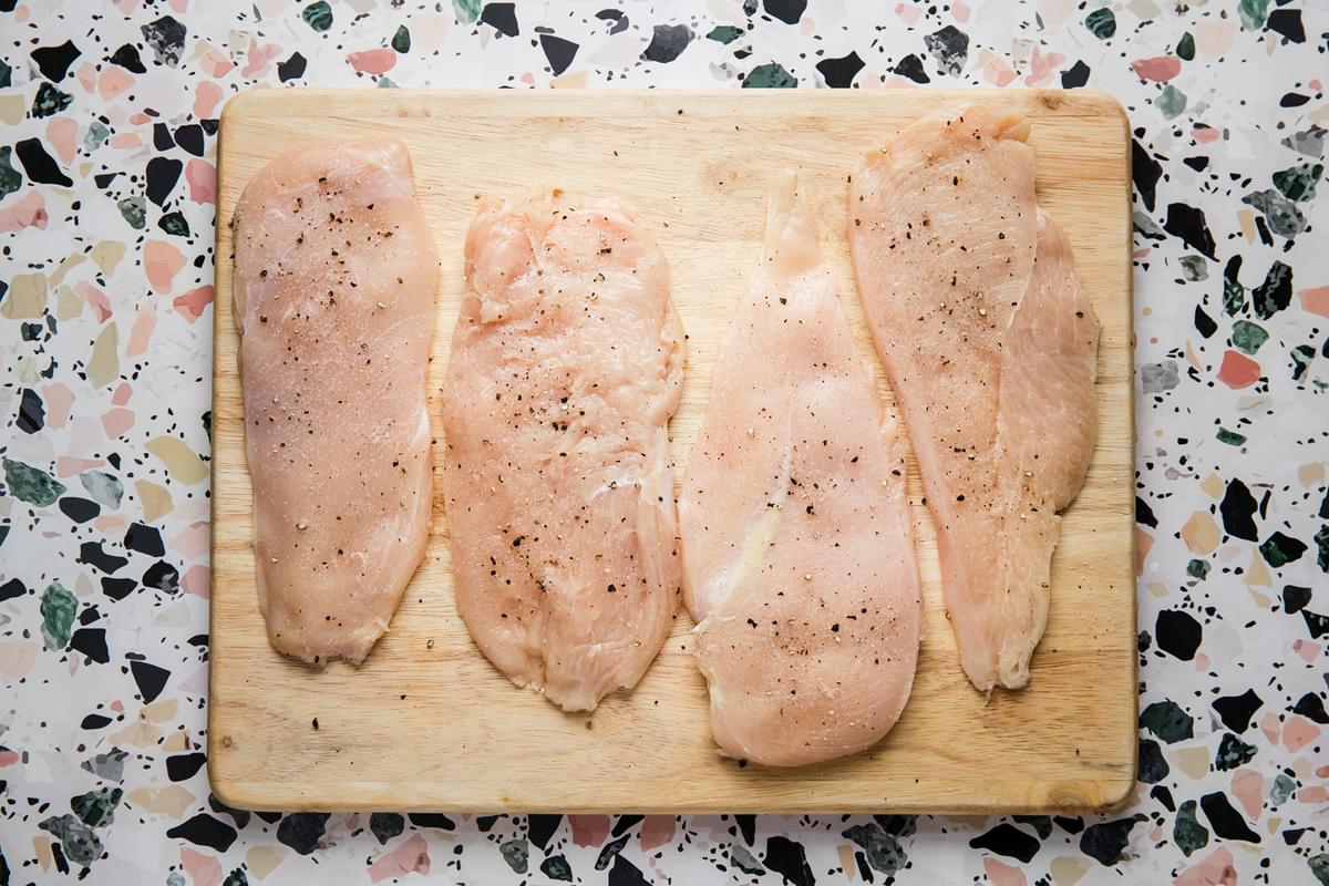Chicken breast pounded thin into Paillard cutlets with salt and pepper
