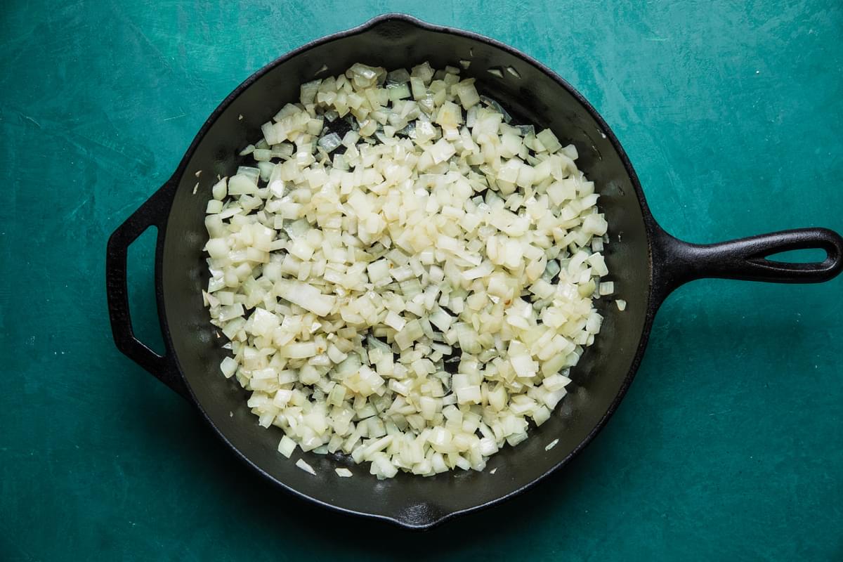 chopped onions cooked in oil in a 12-inch cast iron skillet