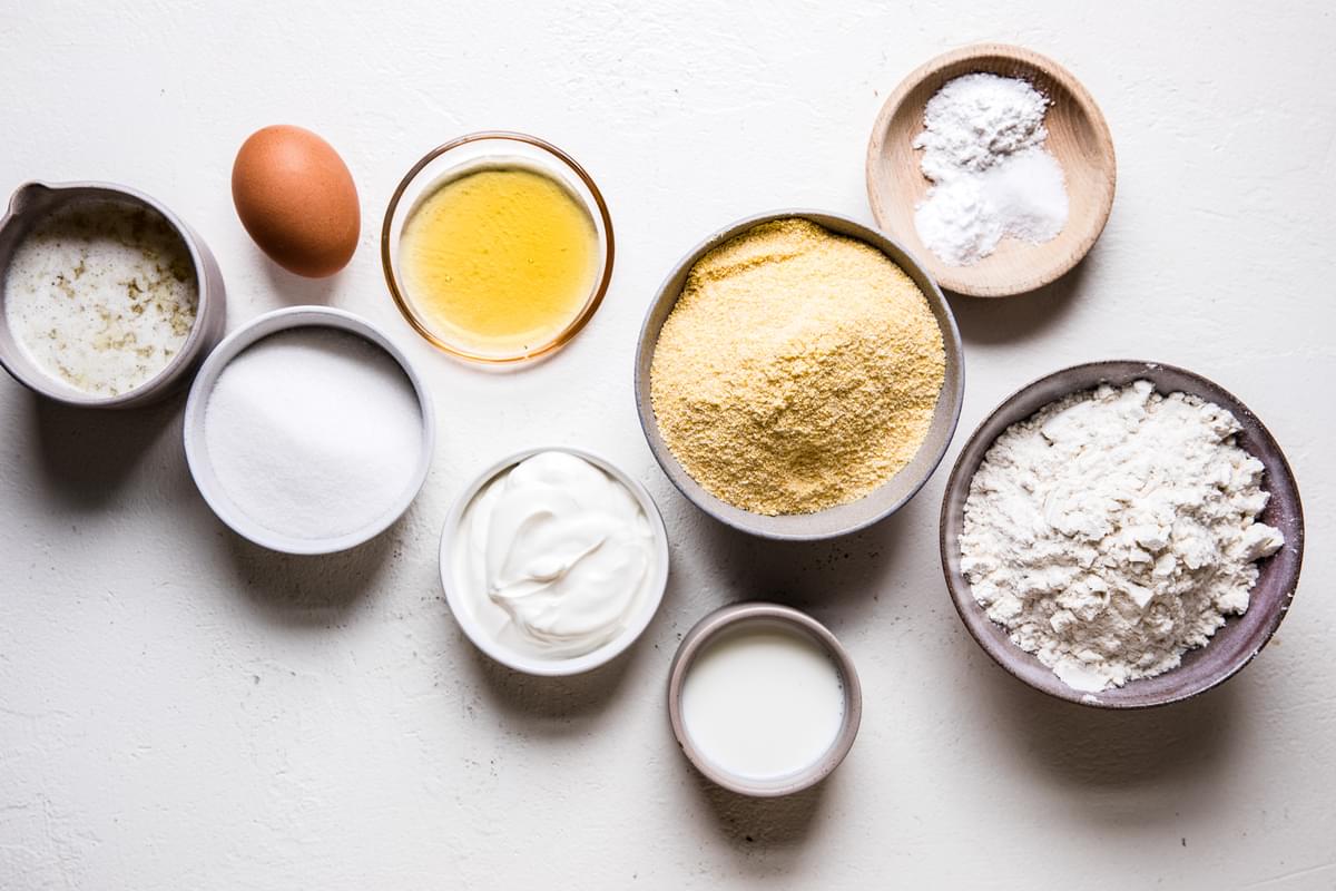 egg, flour, cornmeal, butter, baking powder, baking soda, salt, sour cream and sugar