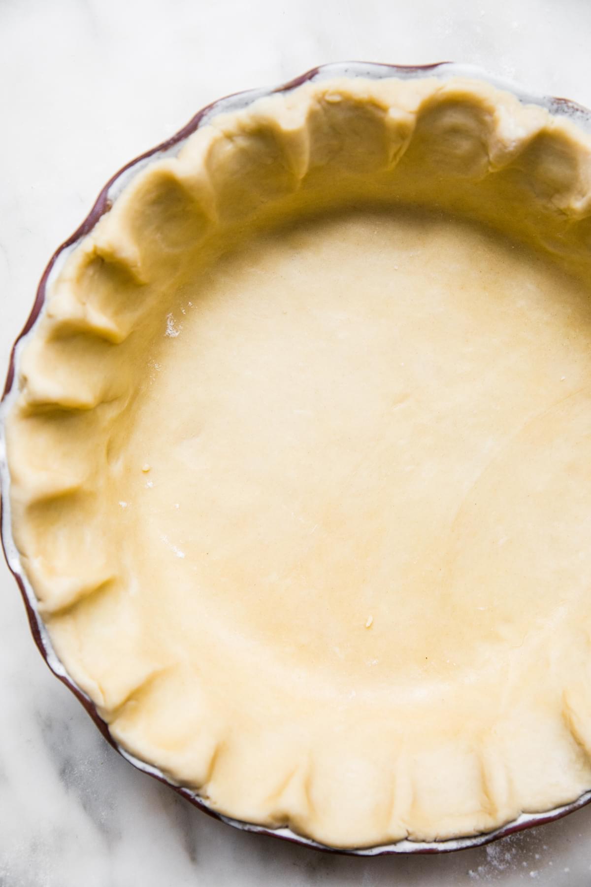 homemade easy all-butter pie crust in a pie pan