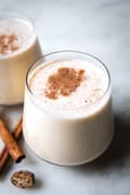 homemade eggnog in a glass with a dusting of nutmeg on top