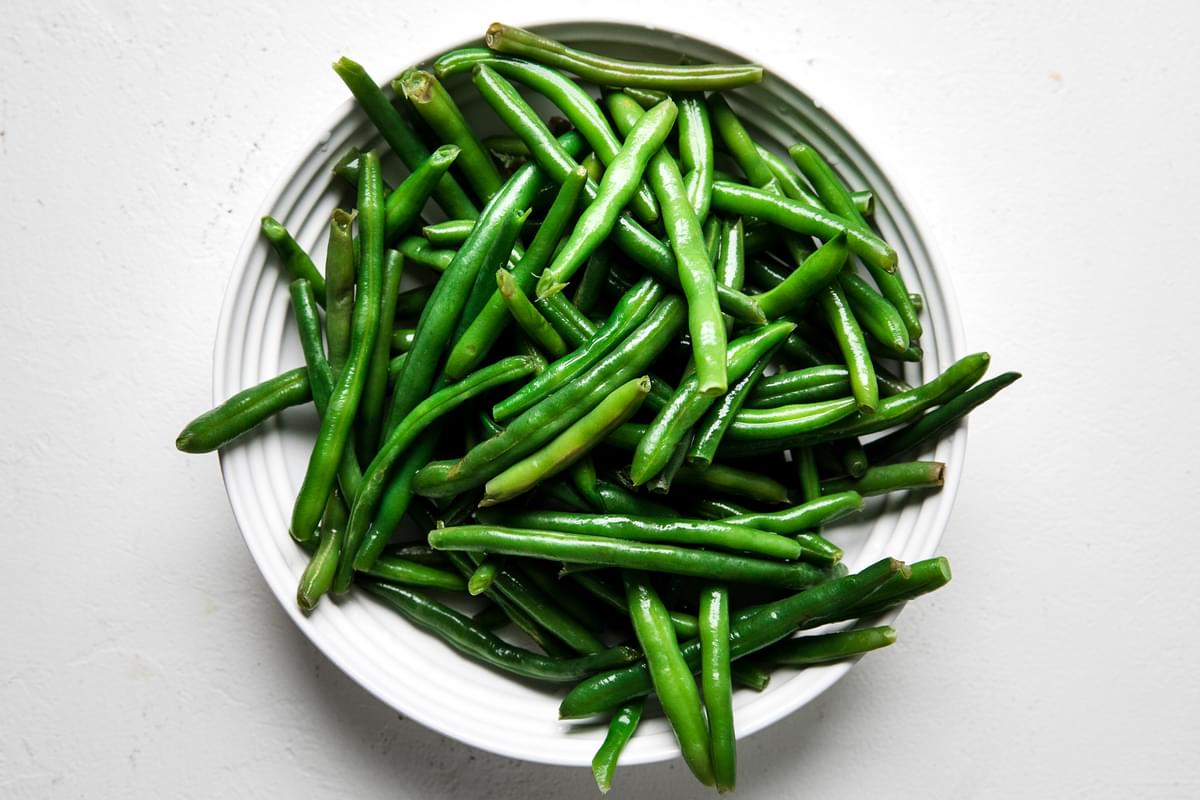 a bowl of fresh green beans