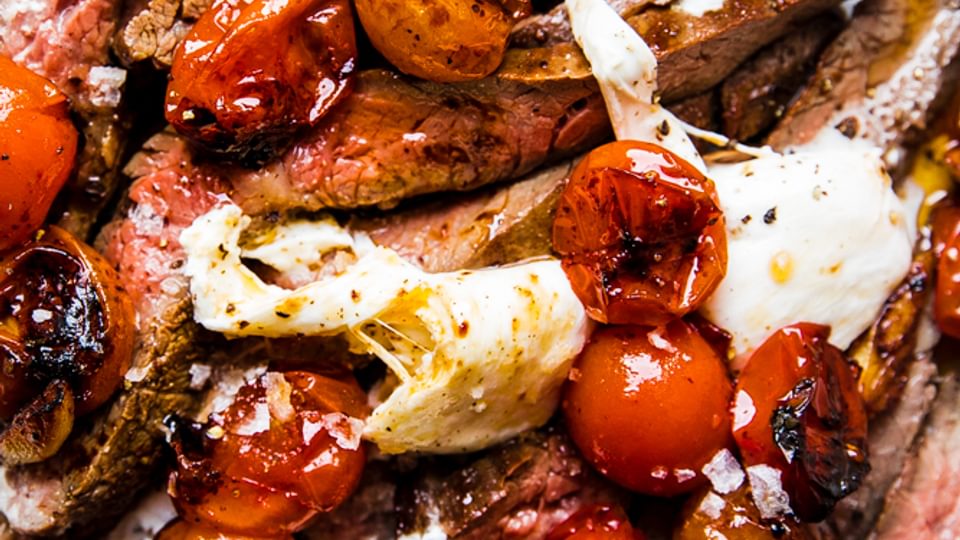 grilled skirt steak with blistered tomatoes and burrata
