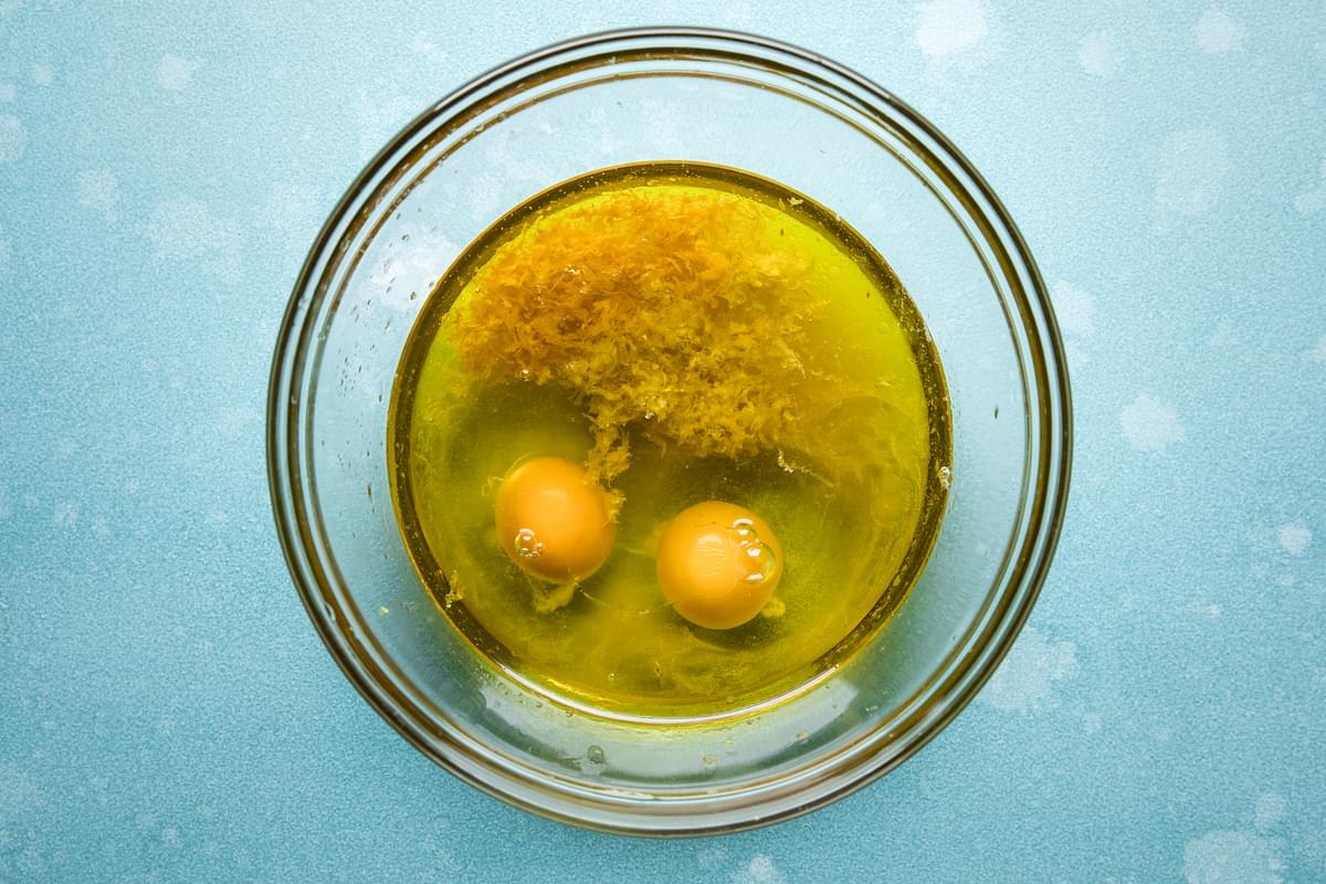 eggs, olive oil and lemon zest in a bowl