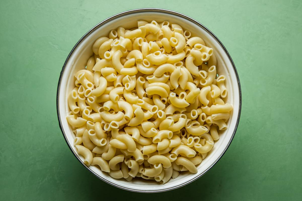 cooked pasta for macaroni salad in a bowl