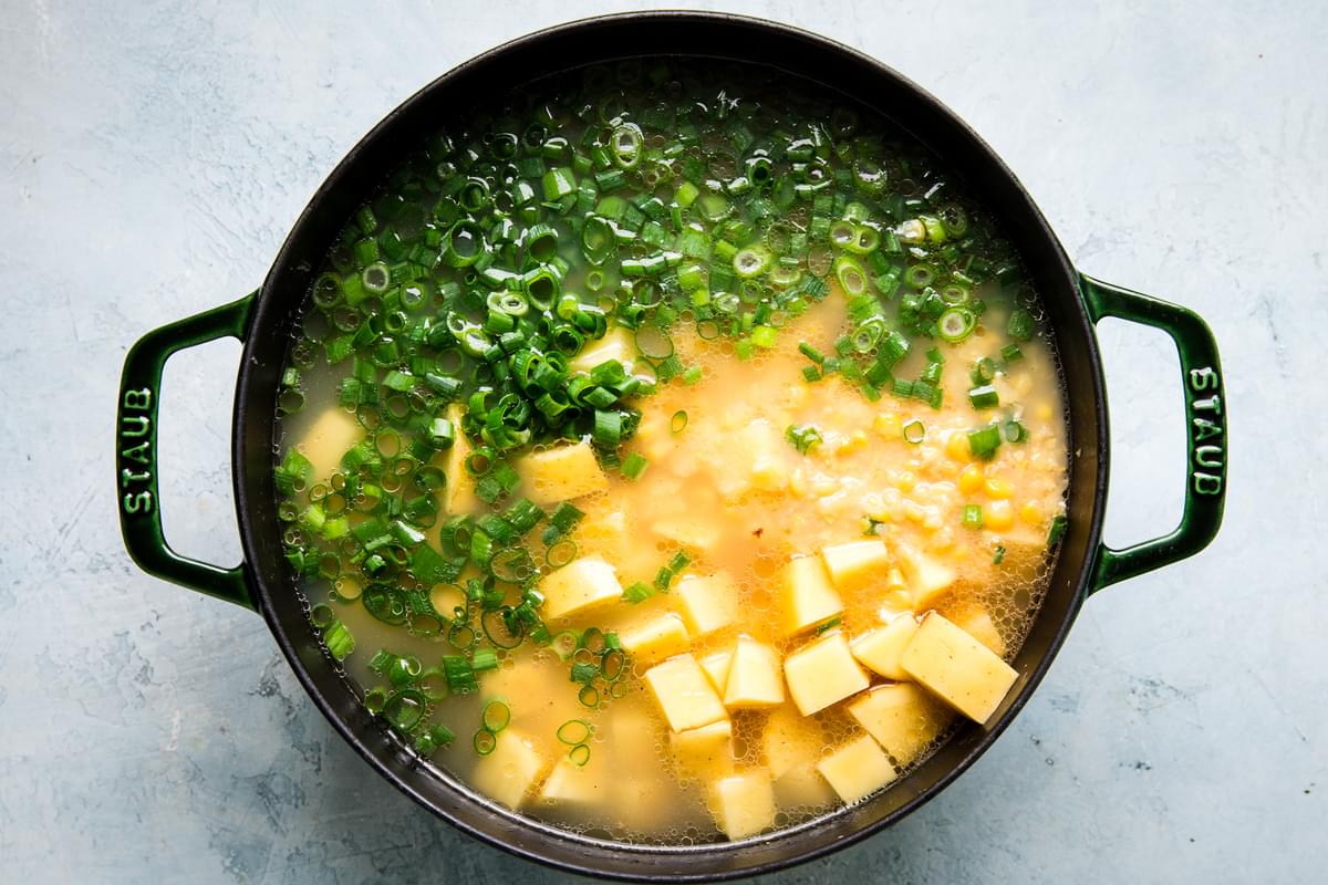 potato and corn chowder ingredients in a stock pot