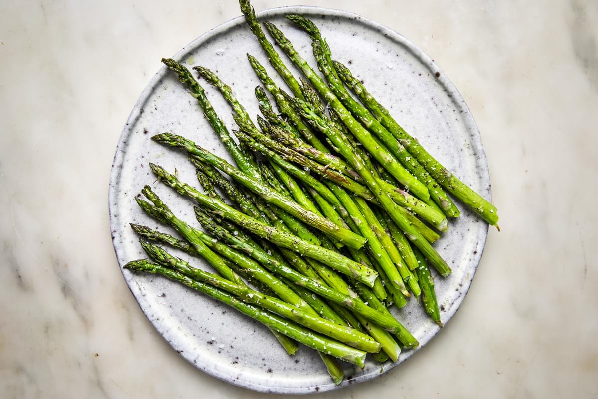 roasted asparagus on a serving plate