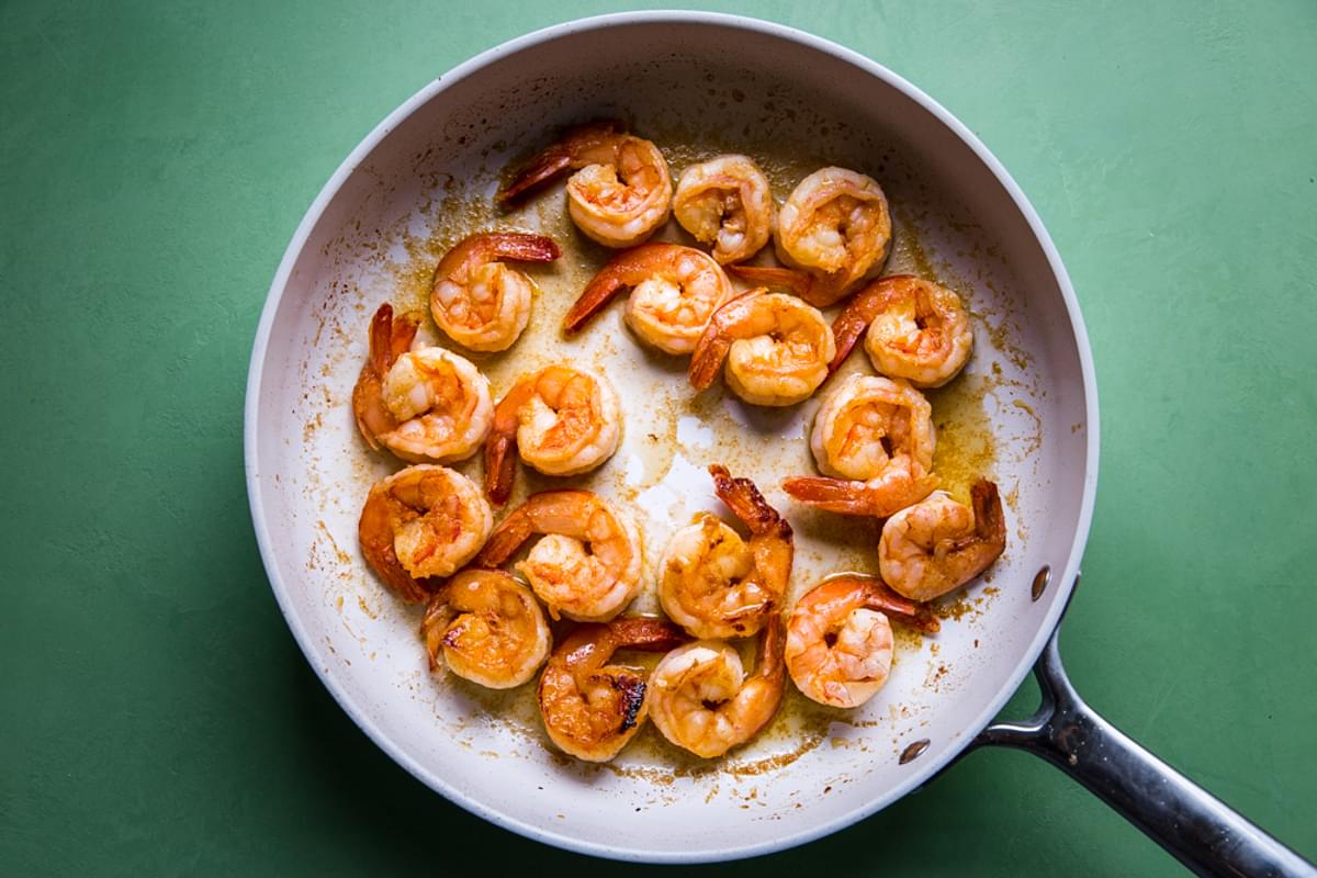 marinated shrimp cooked in a saute pan