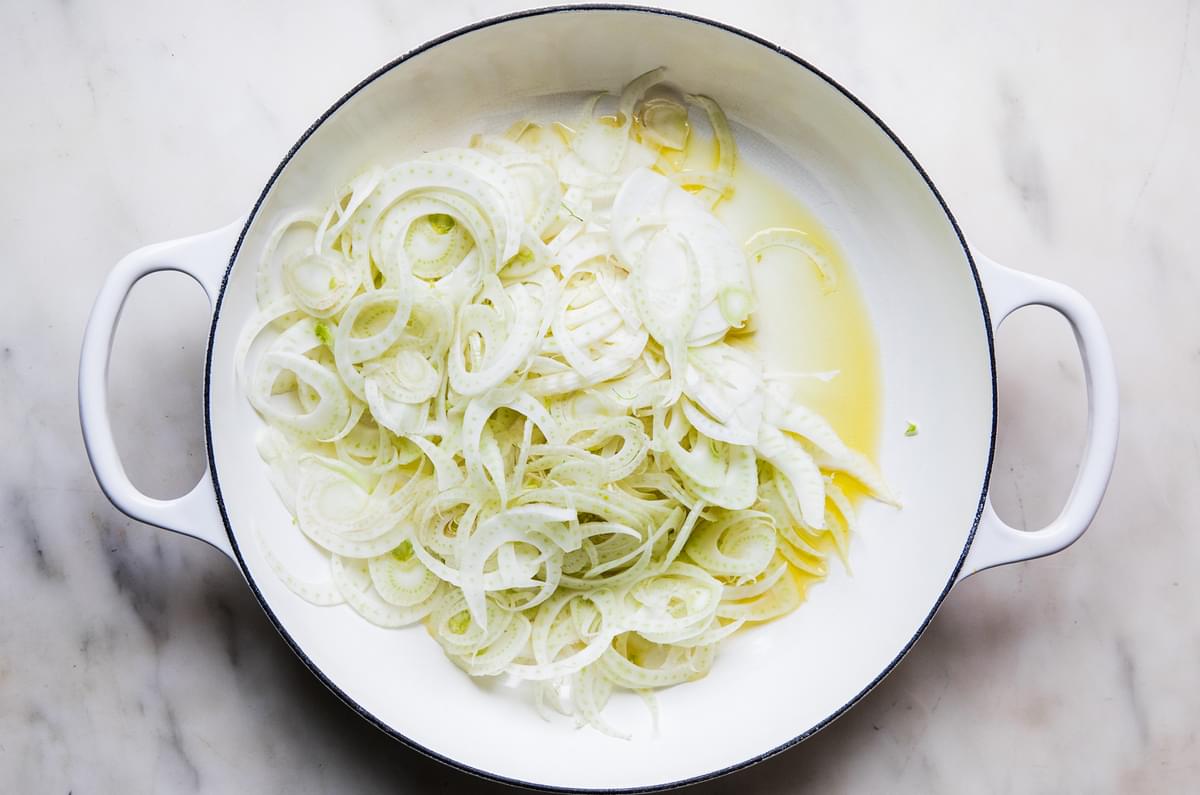 thinly sliced fennel and olive oil in a skillet